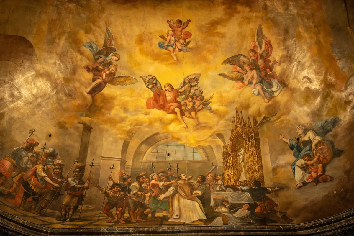 Golden church ceiling fresco of angels gathered above a biblical scene, the heavenly music and worship we join